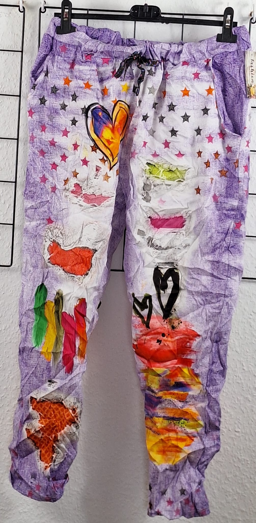 Stylische Damenhose mit buntem Print & Eingriffstaschen