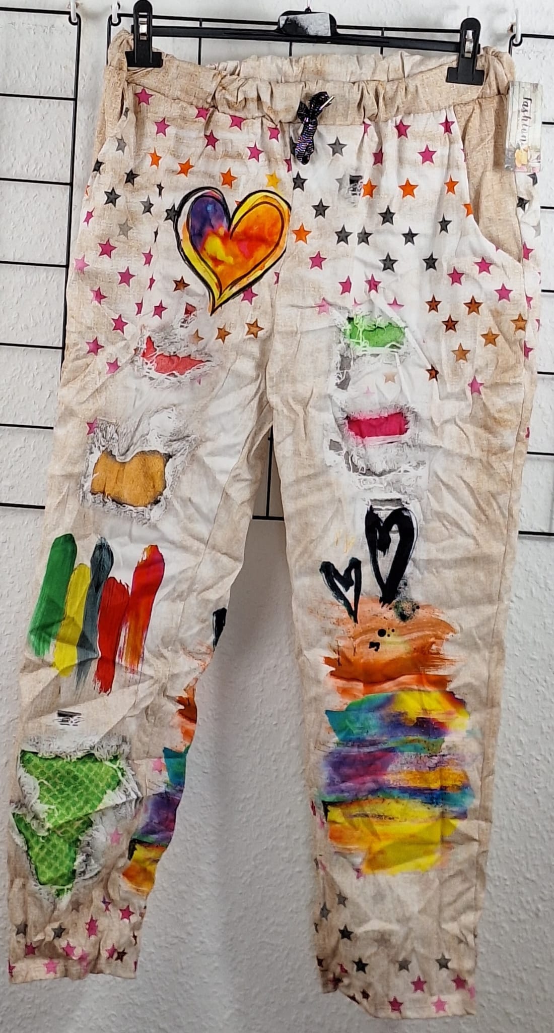 Stylische Damenhose mit buntem Print & Eingriffstaschen