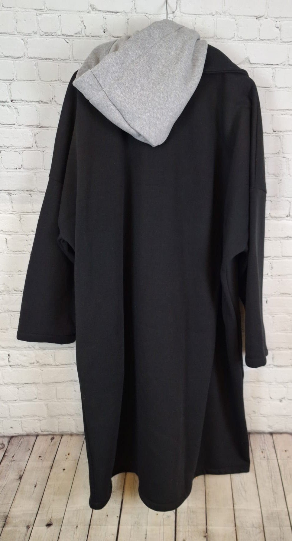 Schicker Mantel mit fester Kapuze