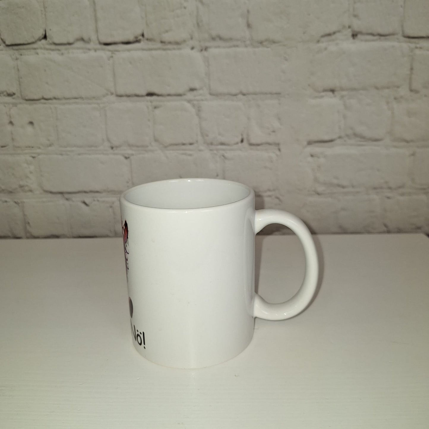 Weiße Keramiktasse mit Zebra Motiv und frechem Spruch